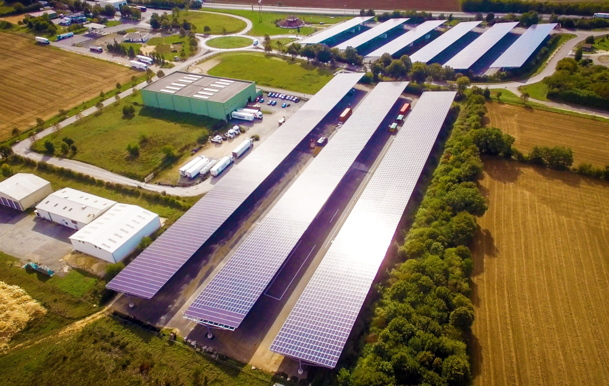 Parking lot canopy construction